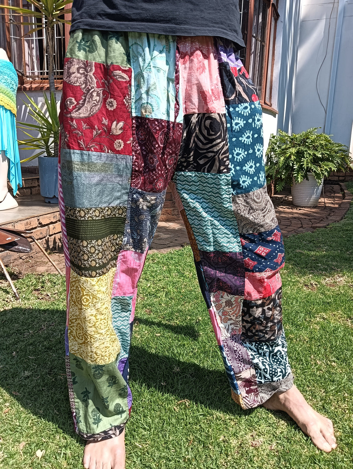 Indian Patchwork Cotton Trousers – full leg view showing variety of cotton print patches from waist to hem