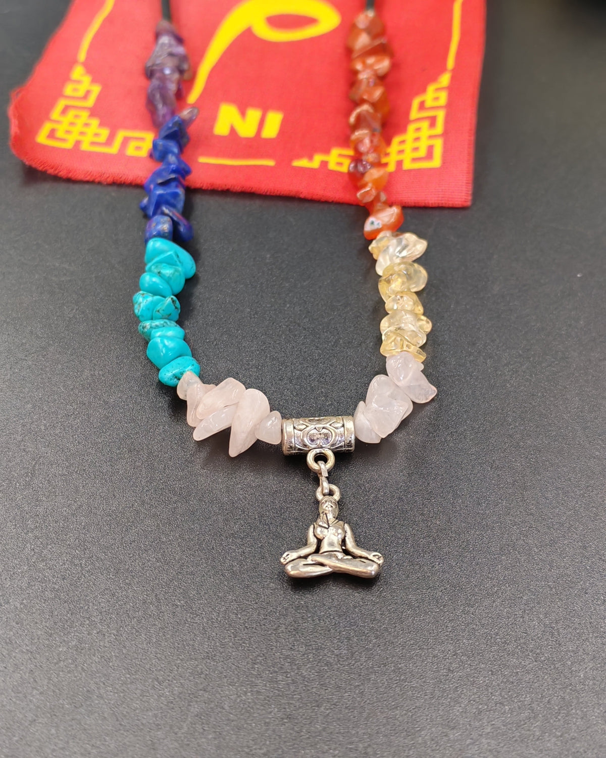 7 Chakra Chip Necklace with Meditating Figure Charm