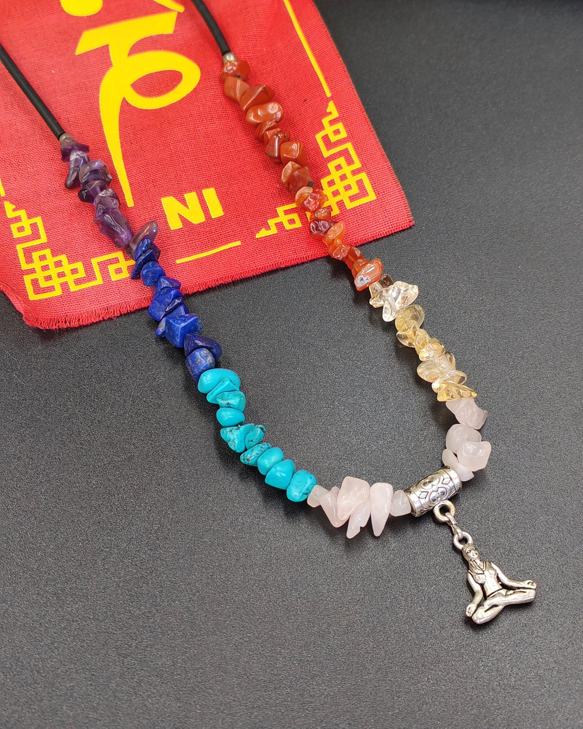 7 Chakra Chip Necklace with Meditating Figure Charm