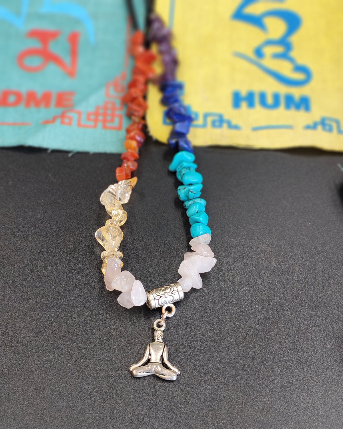 7 Chakra Chip Necklace with Meditating Figure Charm