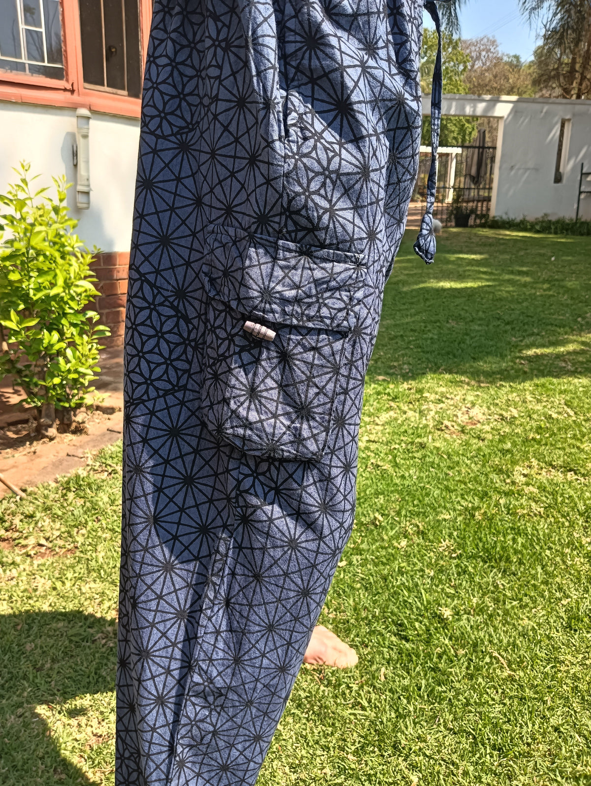 Flower of Life Cotton Cargo Balloon Pants in Navy Blue — cargo pocket zip detail