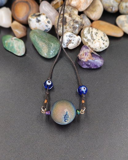 Flame Aura Quartz Sphere Pendant with All-Seeing Eye