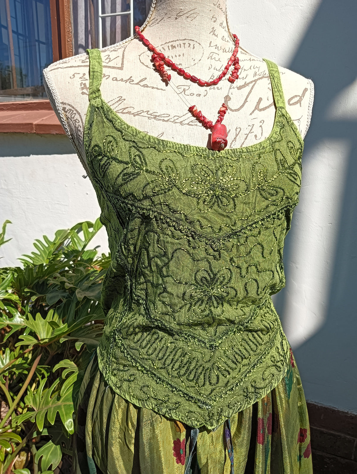 Embroidered Viscose Silk Tank Top in Olive Green — close-up of hand embroidery detail
