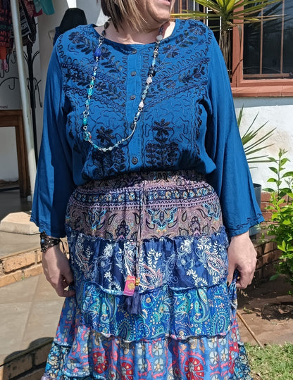 Embroidered Viscose Long Sleeve Blouse in Teal – full front view showing dense black embroidery and ruffle button placket