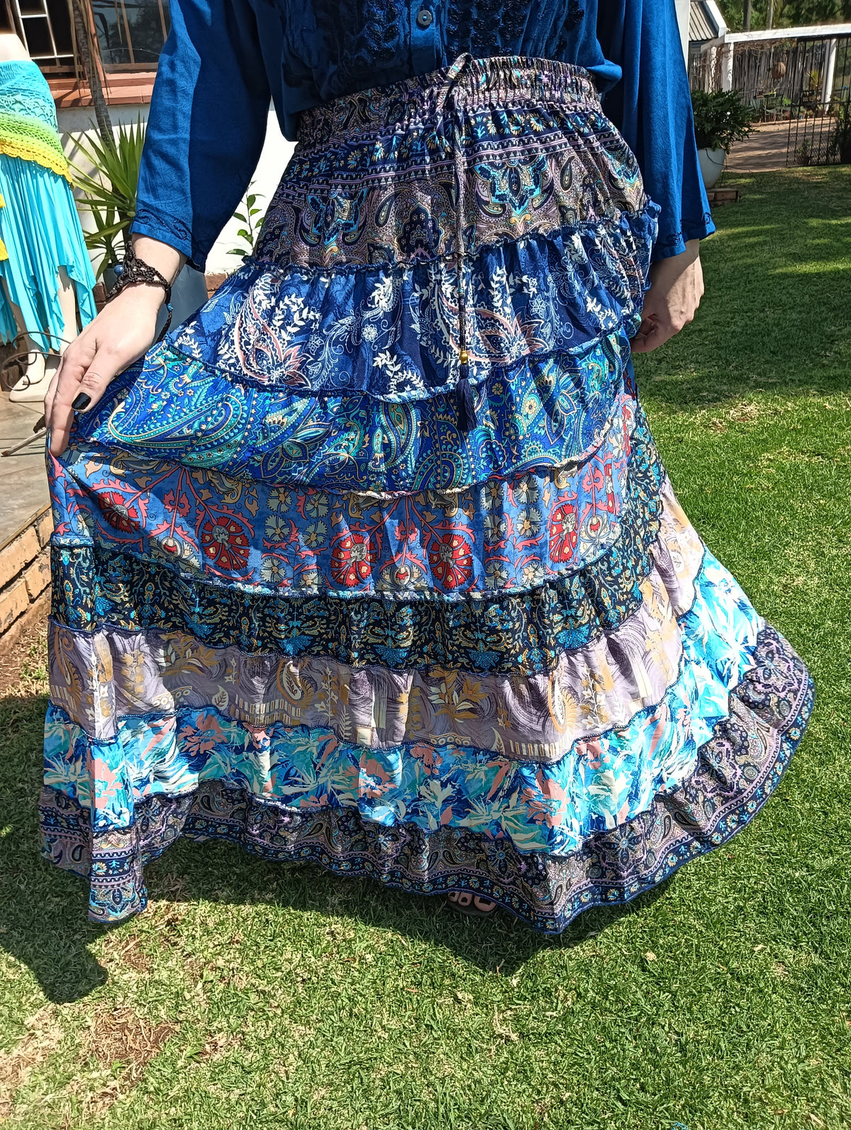 Gypsy Tiered Maxi Skirt in Blue Indian Print – close-up of tiers showing mixed print detail including paisleys and mandalas