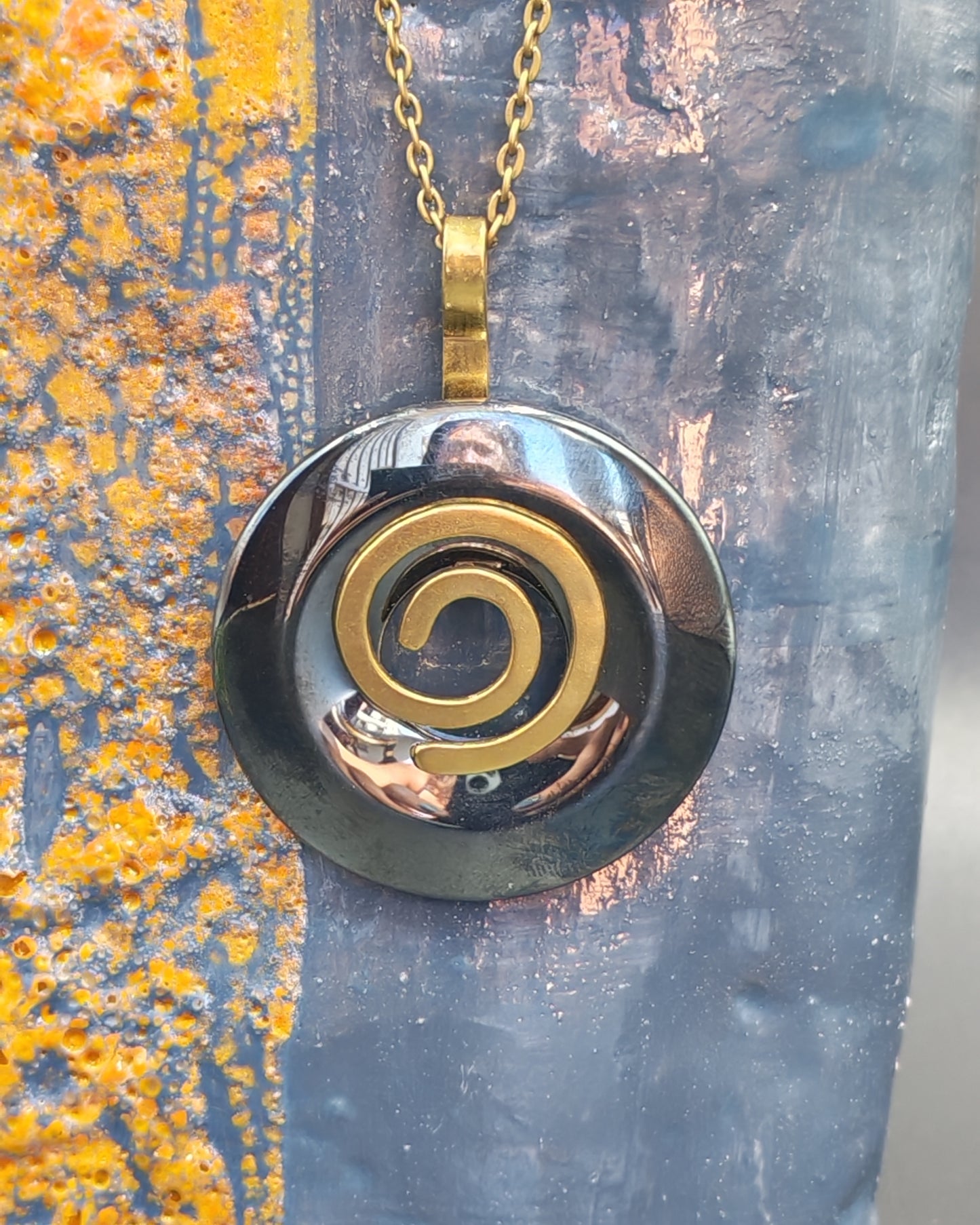 Natural Hematite Donut Pendant with Copper Spiral Setting