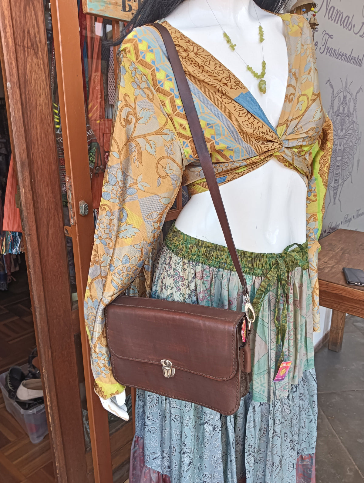 Handcrafted Leather Rectangle Crossbody Bag – worn crossbody on mannequin showing full bag and strap length