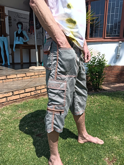 Stone-Washed Cargo 3/4 Shorts in Grey and Neon Orange – side view on male model showing full length and thigh cargo pocket