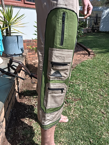 Stonewashed Cargo 3/4 Shorts in Khaki and Olive – close-up of olive green contrast panel showing triple zip pocket system
