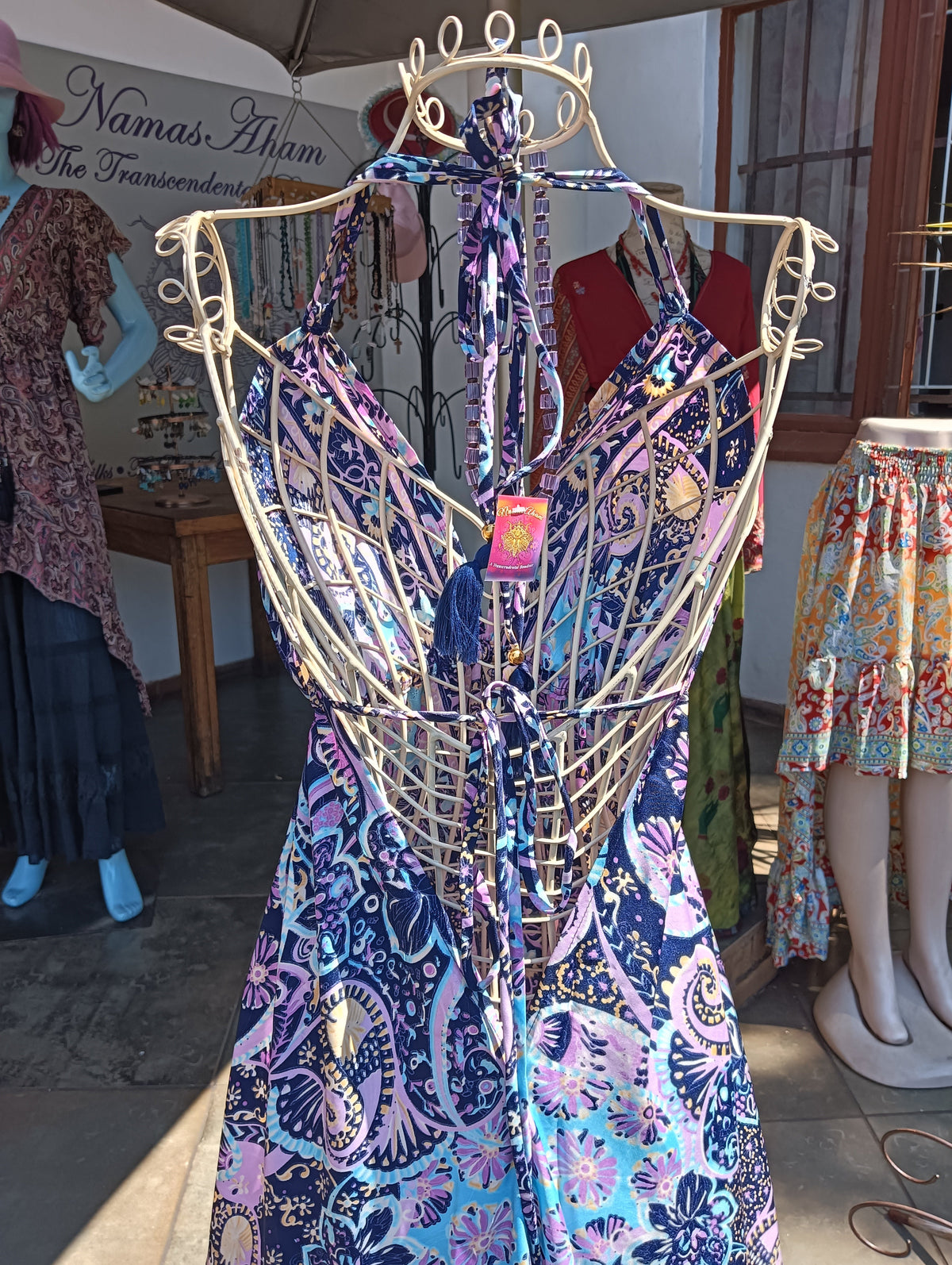 Magic Dress – back view on wire mannequin showing halter tie, tassel detail and open back