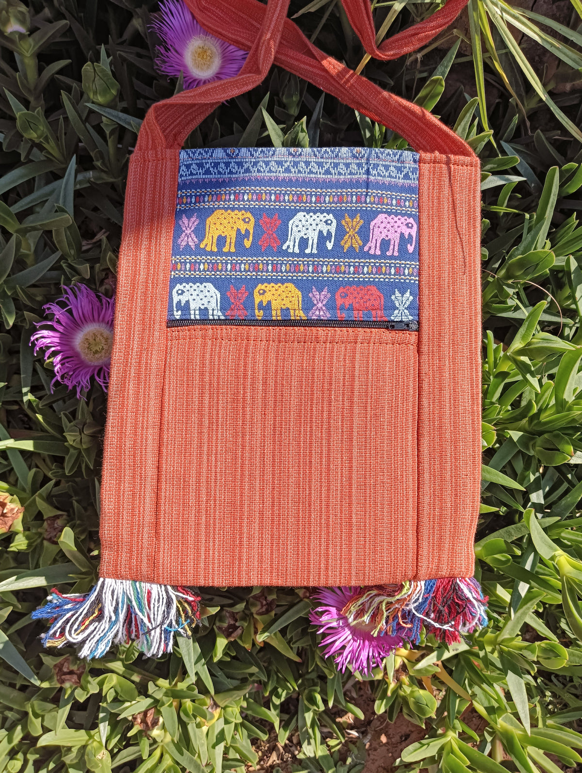 Thai Woven Cotton Sling Bag Terracotta and Blue Elephant – back view showing elephant parade panel and zip pocket