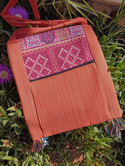 Thai Woven Cotton Sling Bag Terracotta and Pink – back view showing alternative cross-stitch panel arrangement with fringe tassels