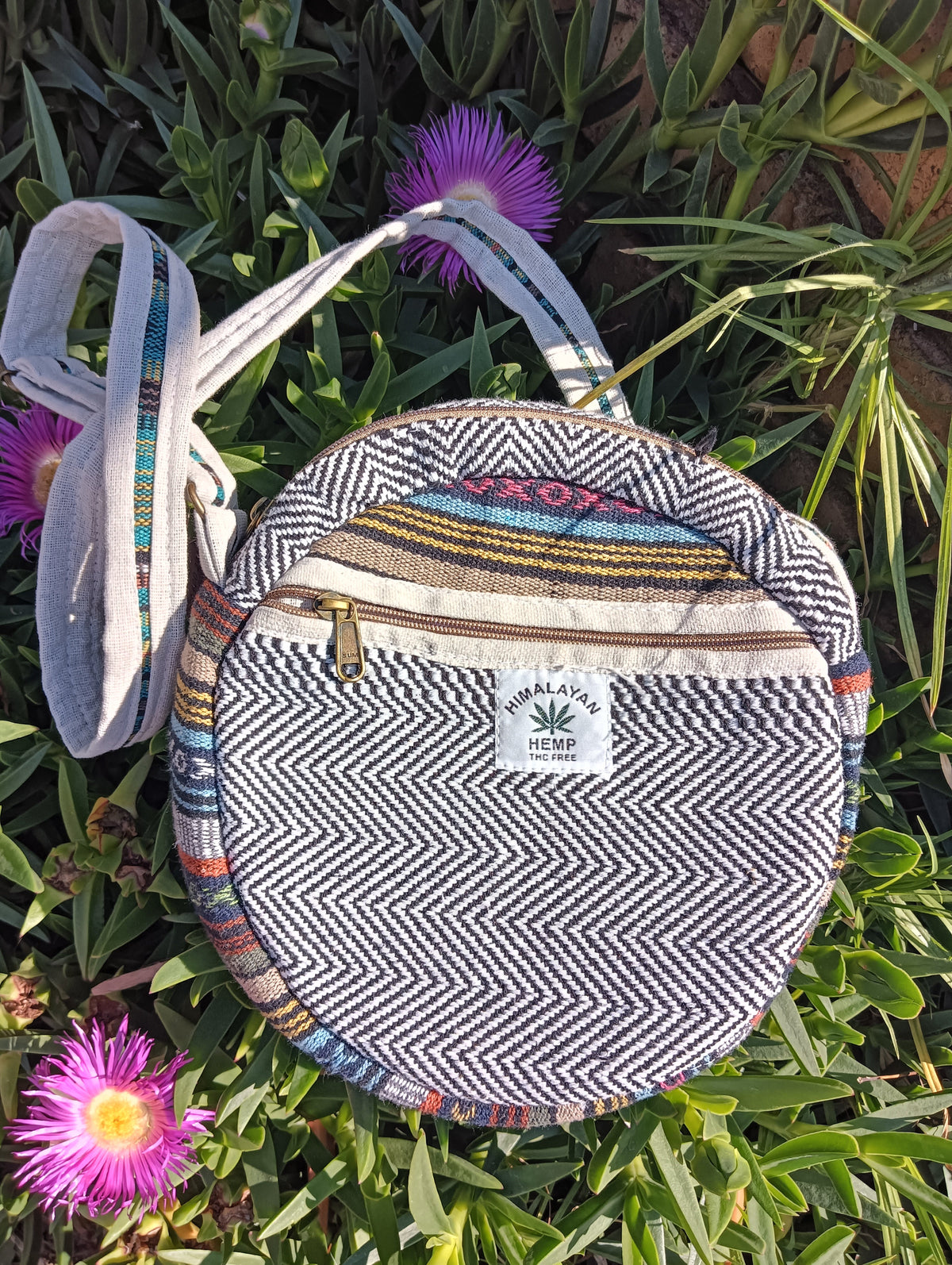 Himalayan Hemp Round Crossbody Bag in Charcoal Black — front view showing herringbone weave