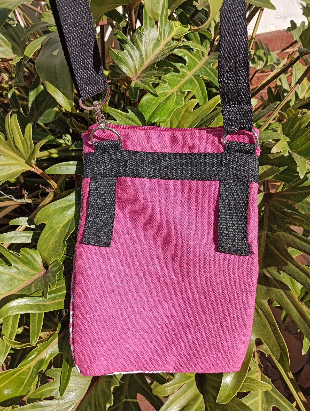 South Africa Print Canvas Bag in Berry Pink — back view showing solid canvas panel and D-ring strap loops