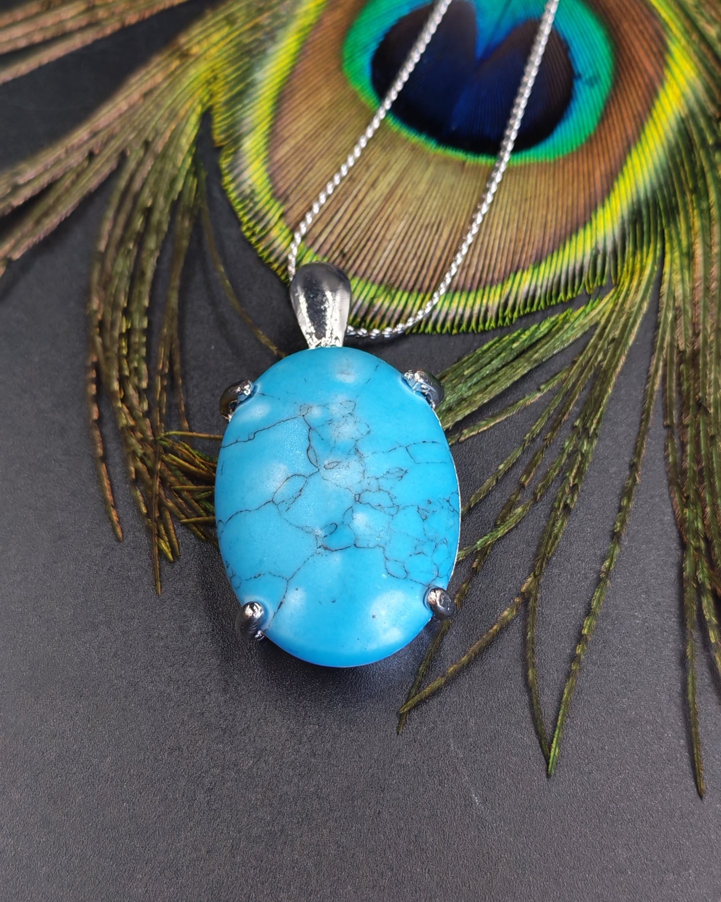 Turquoise Oval Cabochon Claw-Set Pendant
