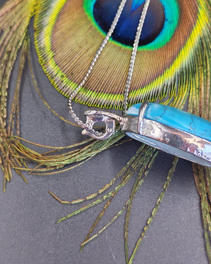 Turquoise Oval Cabochon Claw-Set Pendant