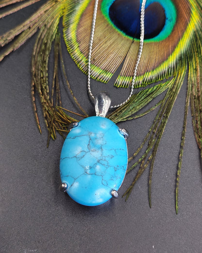 Turquoise Oval Cabochon Claw-Set Pendant