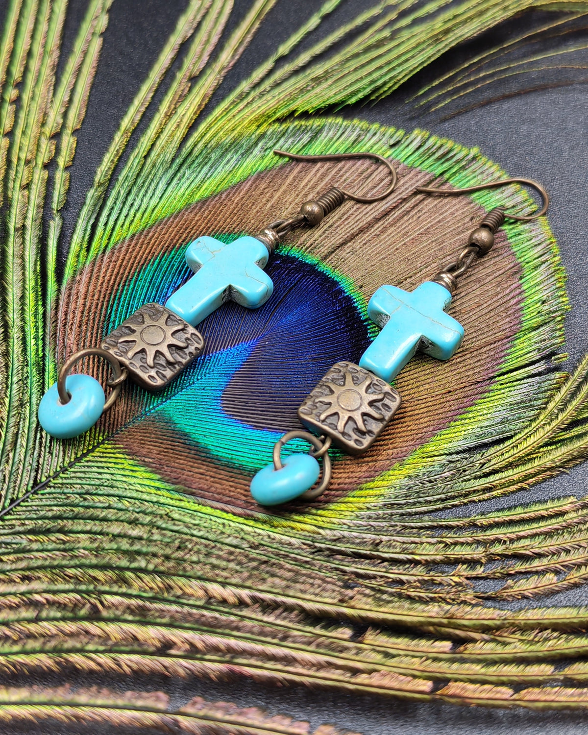 Turquoise Howlite Cross & Aztec Sun Antique Brass Dangle Earrings